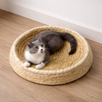 Cat lying on a round woven pet bed